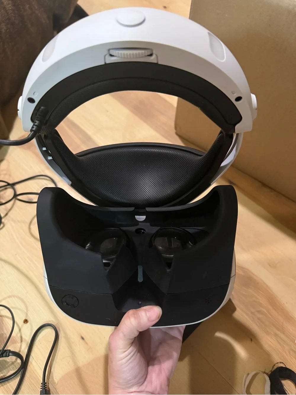 Sony PSVR headset with Black motion controllers and White headset accents